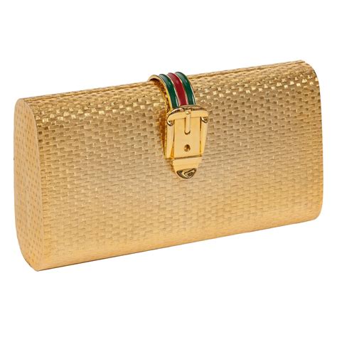 gold clutch gucci